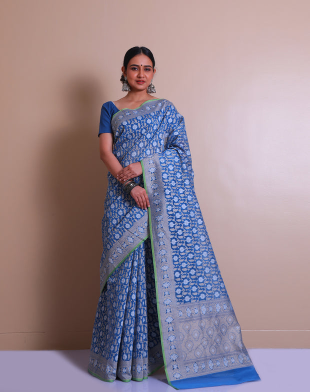 The blue cotton Handloom saree you described sounds charming and elegant. - BSK010565