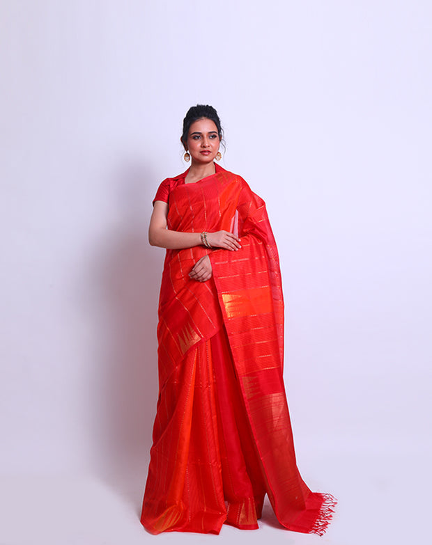 A Kesari Soft South Silk saree with self red lines and Zari lines woven all over - KSL03116