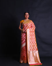 The gold spot Banarasi silk handloom saree with silver zari woven flower design.- BSK010558