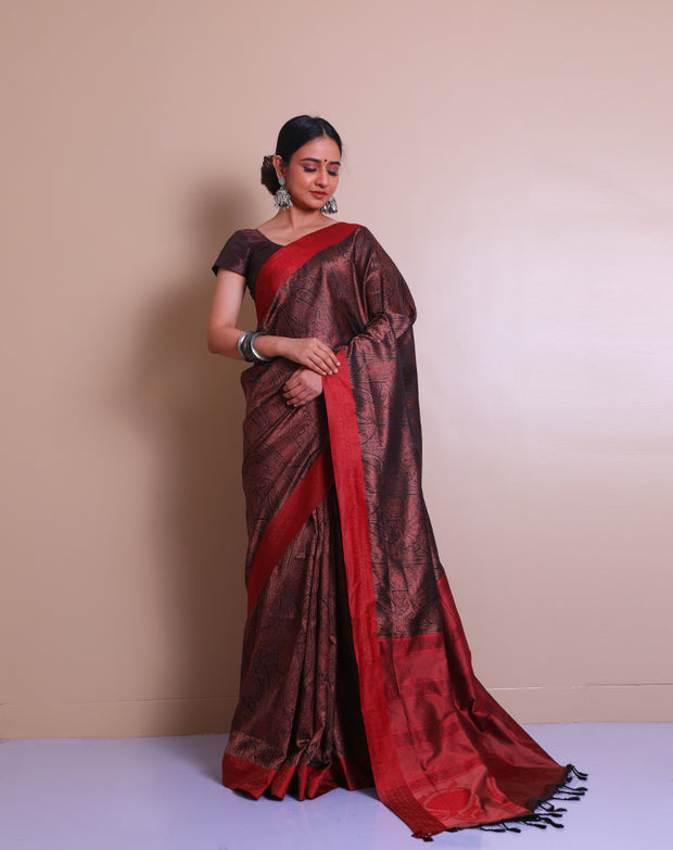 The brown South silk saree with tanchui design woven all over the drape sounds rich and luxurious. - KSL03146