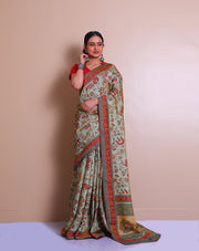 The light green blended saree with zari woven throughout, combined with printed designs on the border, pallu, and drape, sounds elegant - BLN01203