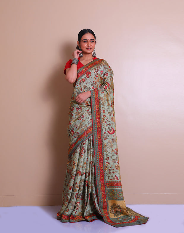 The light green blended saree with zari woven throughout, combined with printed designs on the border, pallu, and drape, sounds elegant - BLN01203