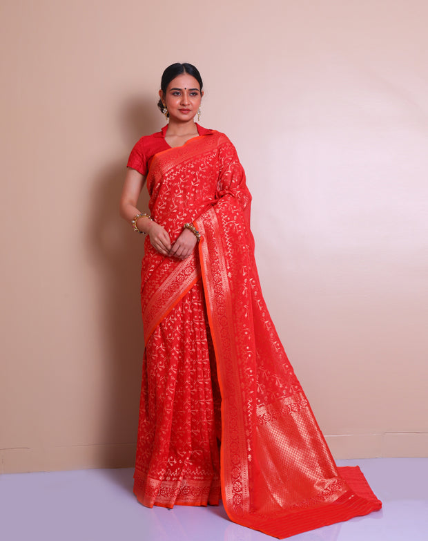The red Banarsi cotton Handloom saree with gold zari details on the border, pallu, - BSK010593