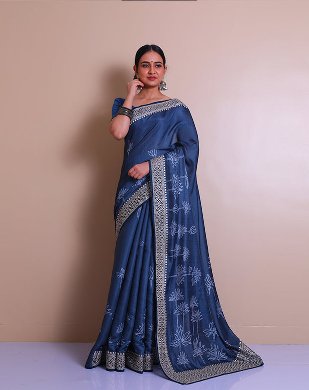 The indigo blended saree with print all over the drape and cutwork embroidery on the border and pallu. - BLN01432