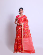 A Tomato Pink Blended Khora saree with a gold zari border and colorful jangla design all over sounds absolutely stunning - CCC02408