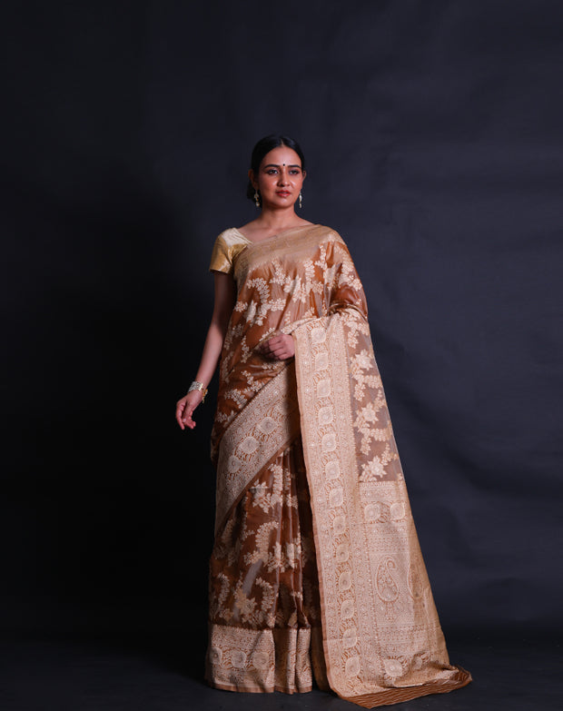 The dark beige blended saree you've described sounds elegant, with its lighter-colored beige motifs in flower designs - BLN01065