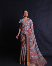 The light blue blended saree with Kalamkari print all over the drape sounds absolutely charming,- BLN00972