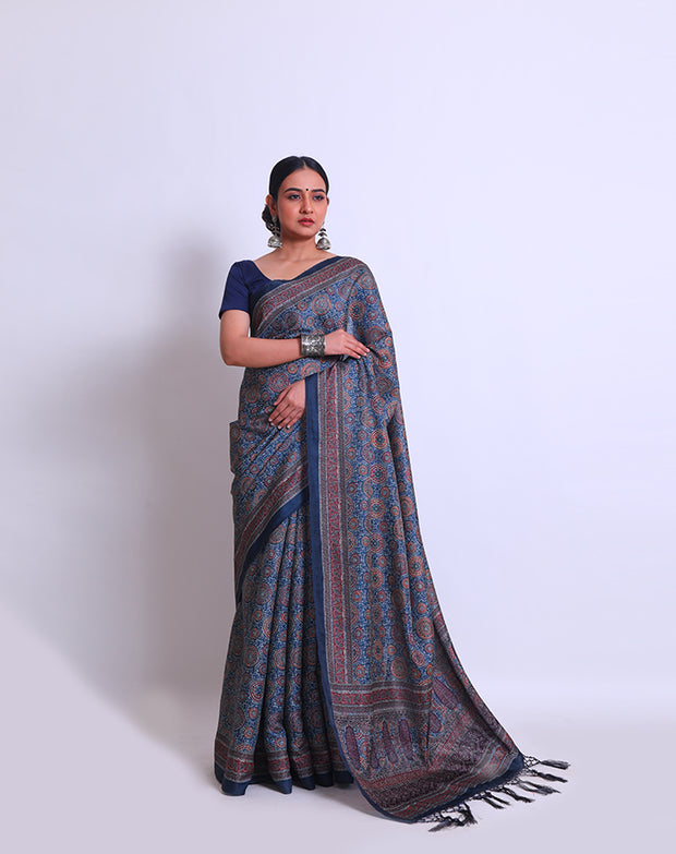 The dark blue semi-printed saree with Ajrak print all over the drape, border - BLN00978