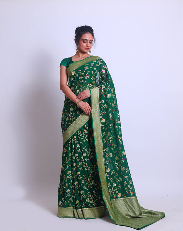 A Bottle Green Khadi Georgette saree with a zari border and pallu - CHG04059