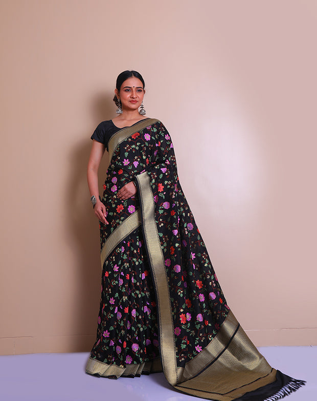 The black Banarsi Handloom silk saree with a gold zari border and pallu - BSK010542