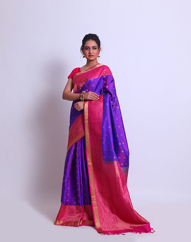 The Purple South silk saree with self-weaving and zari buttis all over the drape sounds absolutely elegant - KSL02428