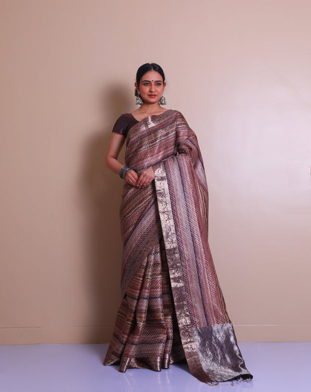 The brown silk Banarasi saree with multi-color zari motifs woven all over the drape sounds absolutely gorgeous.- BSK010464