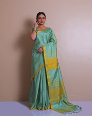 The saree is a lovely image of a sea green Kanjivaram silk saree with mustard accents - KSL03110