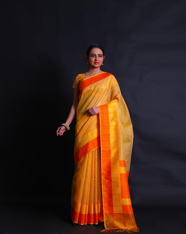 The yellow Banarasi kora saree you described sounds exquisite and vibrant.- BSK05679