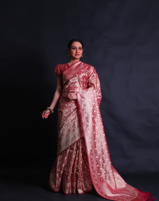 The pink Banarasi tissue saree you're describing sounds absolutely stunning.- BSK010772