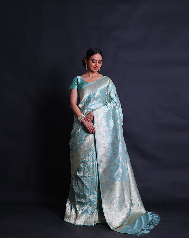 The light blue Banarasi silk saree with modern flower designs woven in zari sounds absolutely enchanting,- BSK010765