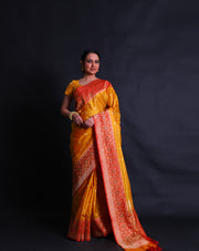 The mustard Banarasi silk saree you're describing sounds absolutely stunning.- BSK010581