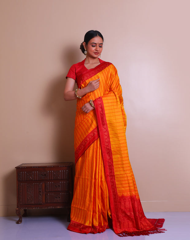 The Mustard Banarsi tanchui silk saree adorned with thread woven designs in contrast red on the border, pallu, - BSK09549
