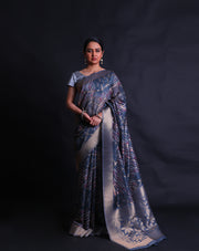 The dark grey blended saree with print all over and zari lines woven throughout the drape,- BLN01275