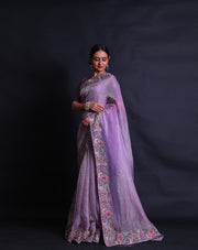 The mauve tissue saree you've described sounds absolutely lovely, especially with the petit point embroidery adding delicate details.- EMB03359