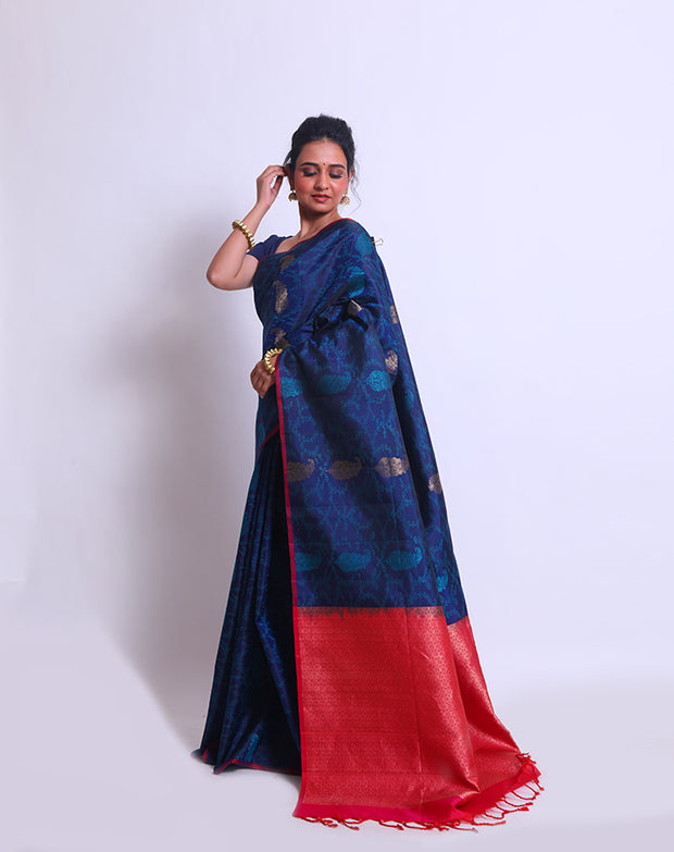 The Navy Blue South Silk Handloom saree with lighter blue woven all over the drape sounds elegant and sophisticated - KSL03152