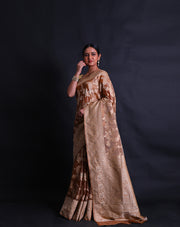 The dark beige blended saree you've described sounds elegant, with its lighter-colored beige motifs in flower designs - BLN01065