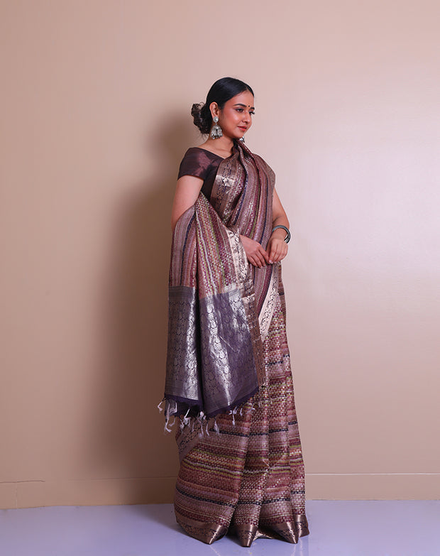 The brown silk Banarasi saree with multi-color zari motifs woven all over the drape sounds absolutely gorgeous.- BSK010464