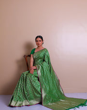 The green Banarsi Handloom silk saree with zari woven details on the border, pallu, - BSK07071