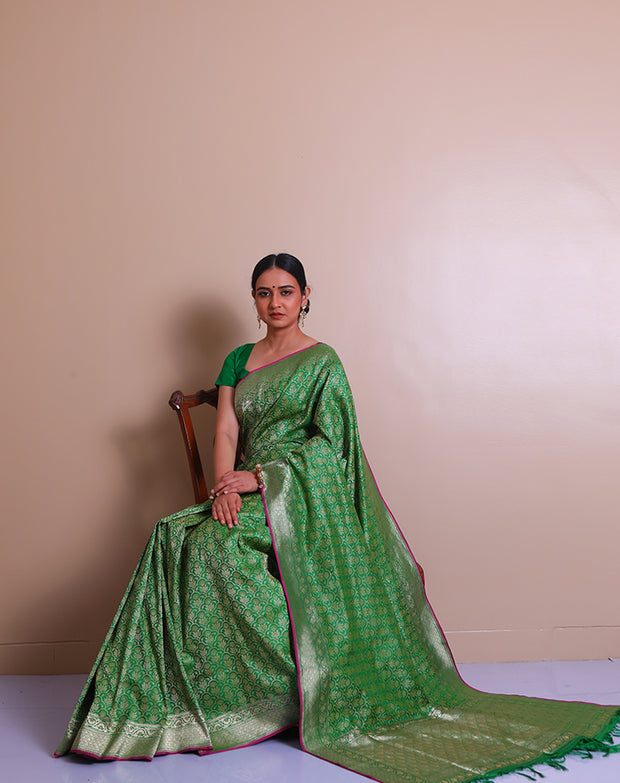 The green Banarsi Handloom silk saree with zari woven details on the border, pallu, - BSK07071