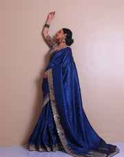 The navy blue embroidered saree with zari lines all over the drape, - EMB03353