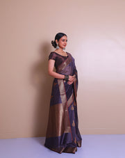 The dark mauve Banarasi cotton saree with a zari border and pallu sounds absolutely elegant. - BSK010739