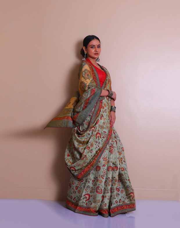 The light green blended saree with zari woven throughout, combined with printed designs on the border, pallu, and drape, sounds elegant - BLN01203