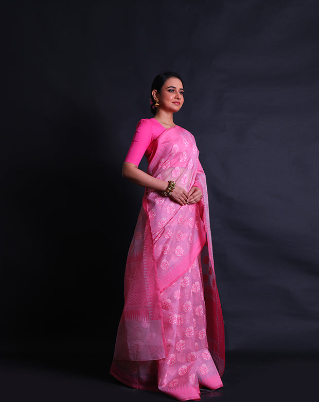 The pink Banarasi handloom cotton saree you're describing sounds exquisite and elegant.- BSK010575