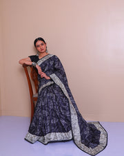 The black blended Tussar saree with Parsi embroidery on the border and pallu sounds absolutely exquisite - BLN01414