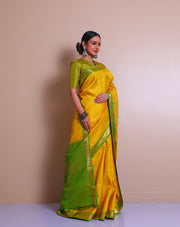 A Yellow Uppada real zari saree is adorned with small buttis of silver and gold zari scattered throughout the drape, - KSL02713