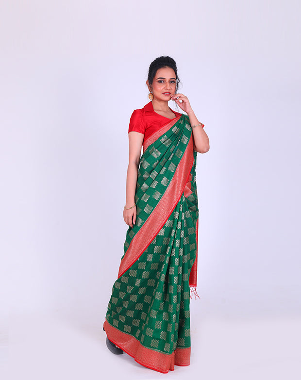 Soft Tussar Bottle Green Handloom Saree with Zari weaving all over sounds stunning - BSK010659