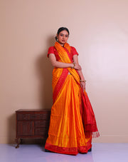 The Mustard Banarsi tanchui silk saree adorned with thread woven designs in contrast red on the border, pallu, - BSK09549