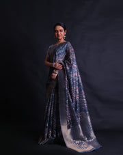 The dark grey blended saree with print all over and zari lines woven throughout the drape,- BLN01275