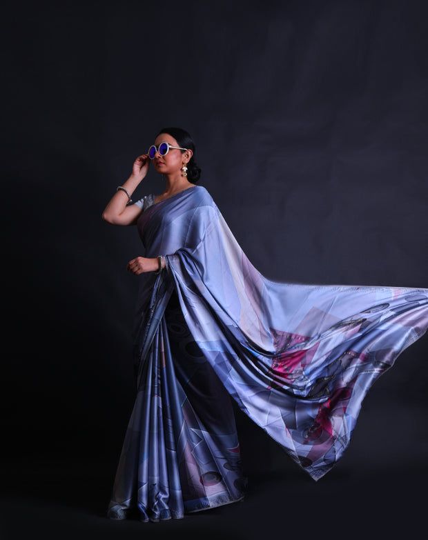 The grey blended satin crepe saree with different colors in digital modern print and stone embroidery all over the drape,- BLN01368