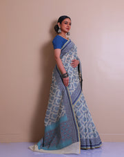 The beige cotton handloom saree with light blue and dark blue thread woven throughout sounds absolutely lovely - BSK010773