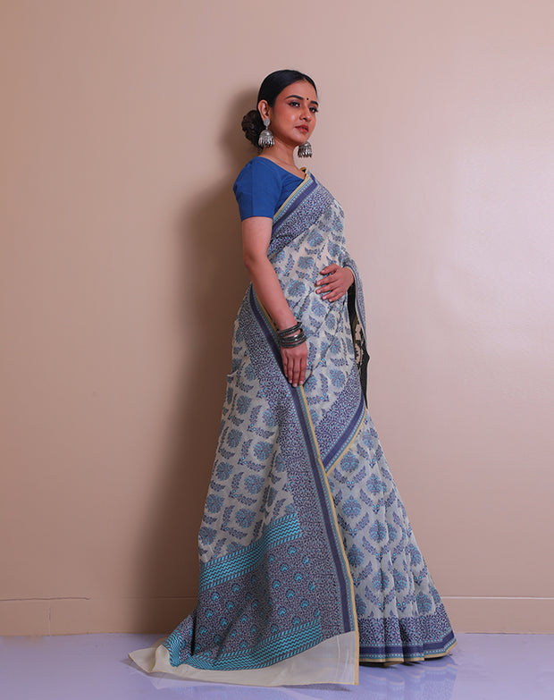 The beige cotton handloom saree with light blue and dark blue thread woven throughout sounds absolutely lovely - BSK010773
