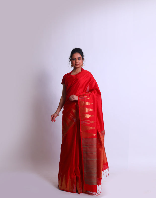 A Red Soft South Silk saree with a gold and silver Zari temple border and red tassels sounds exquisite - KSL02869