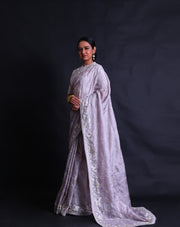 The lilac silk Kota saree with thread embroidery all over the drape sounds lovely and delicate.- EMB03357
