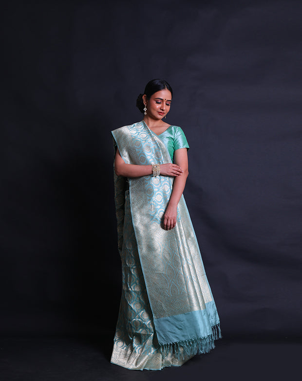 The light blue Banarasi silk saree with modern flower designs woven in zari sounds absolutely enchanting,- BSK010765