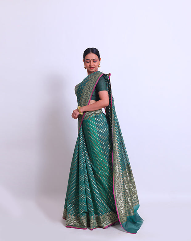 The bottle green fancy cotton saree with thread and zari woven all over the drape - BSK010448