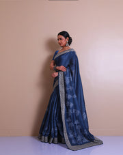 The indigo blended saree with print all over the drape and cutwork embroidery on the border and pallu. - BLN01432