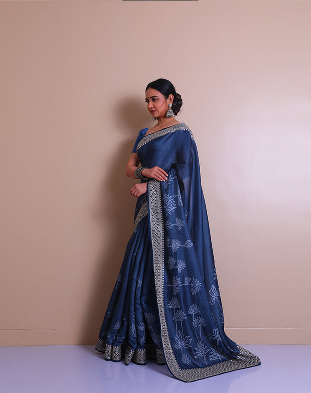 The indigo blended saree with print all over the drape and cutwork embroidery on the border and pallu. - BLN01432