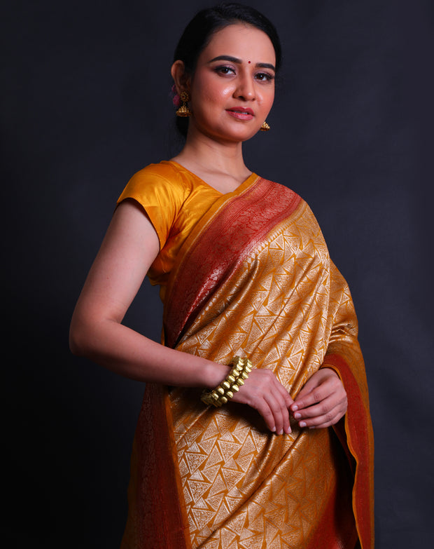 The mustard Banarasi handloom cotton saree woven in brocade style with geometrical design.- BSK010627