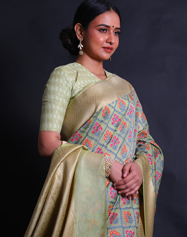 The green Banarasi cotton saree with Meenakari design all over the drape sounds absolutely stunning.- BSK010538