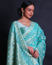 The sea green kora cotton saree with intricate thread and zari motifs sounds elegant,- BSK010529